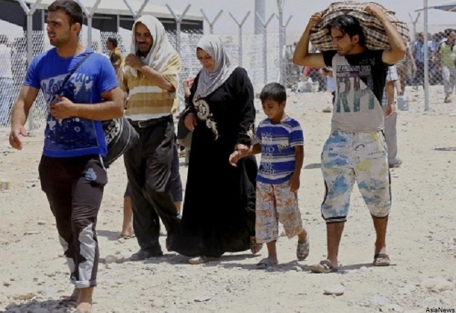 Una “N” sulle case dei cristiani A Mosul (Iraq) è pulizia etnica