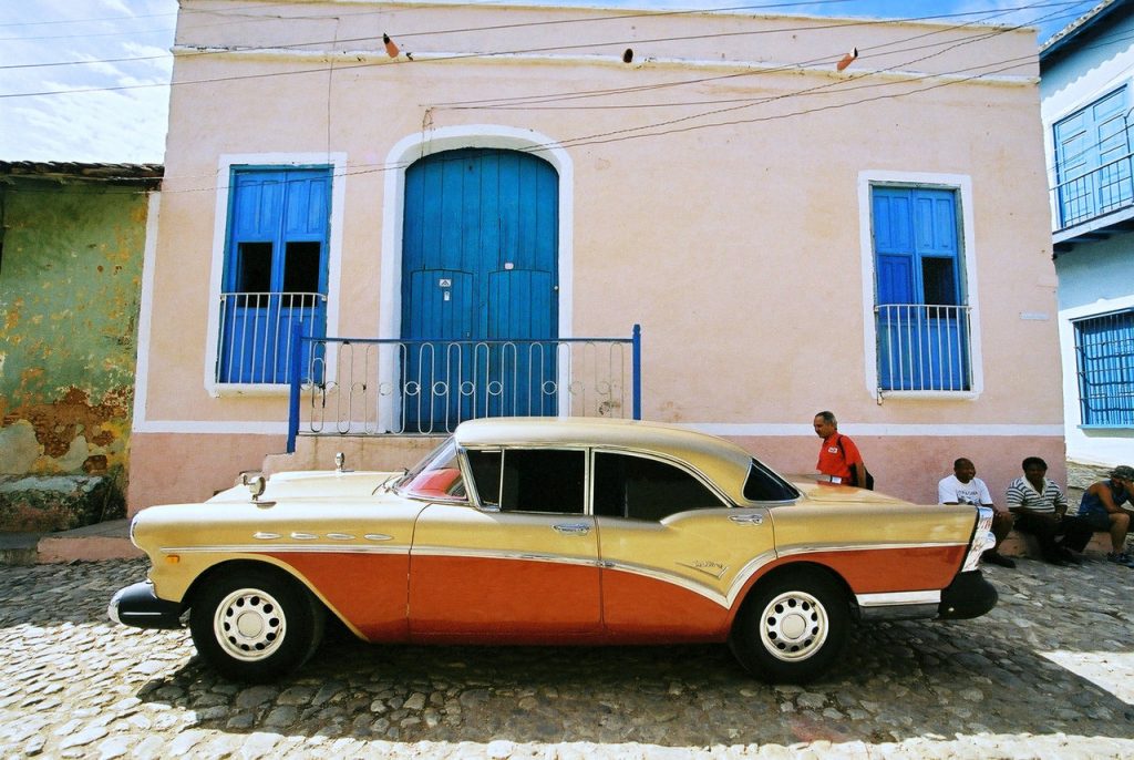 Old_golden_red_car_in_Cuba_by_Schweiko