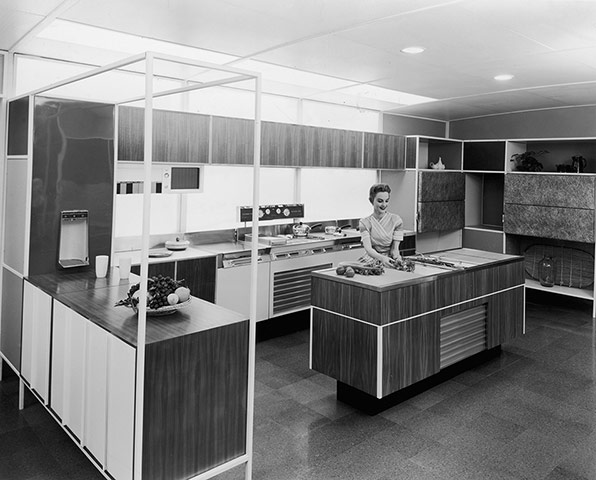 A Formica wood effect paneled kitchen, 1950s
