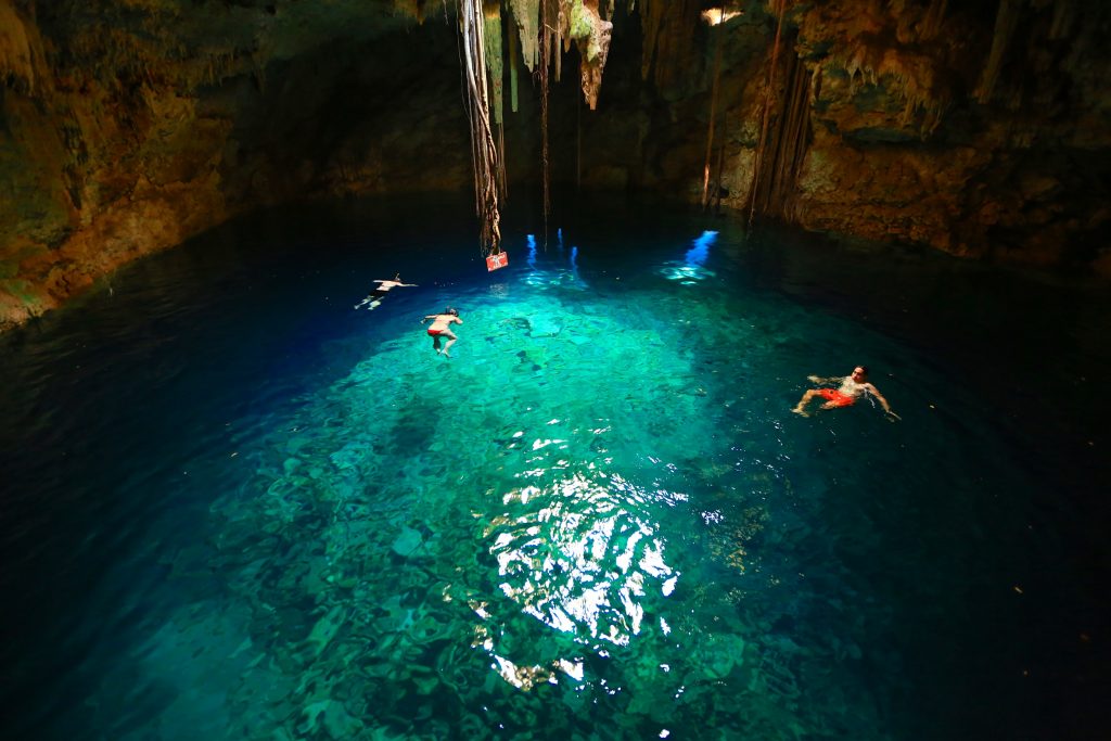 Bathe in a cenote (a deep natural sinkhole) in the Yucatán