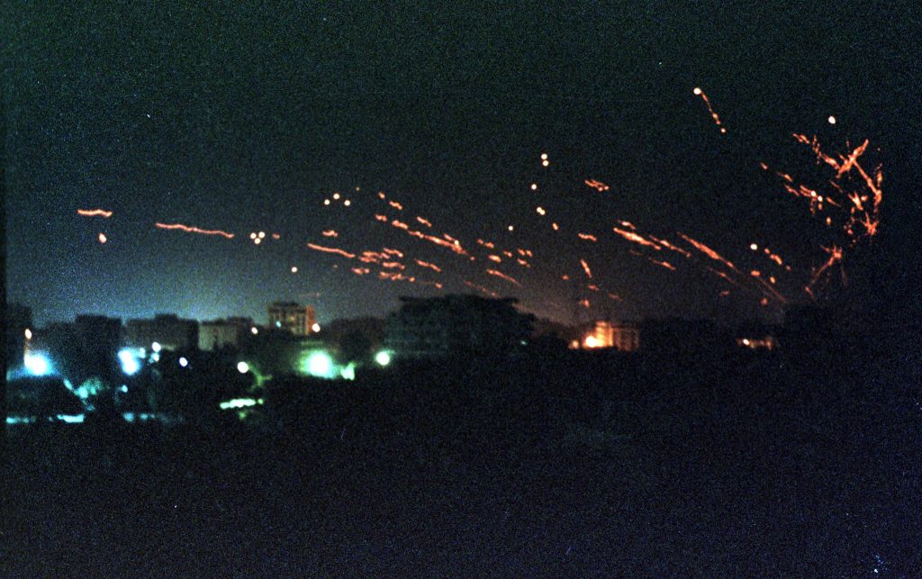 FILE PHOTO OF BAGHDAD LIT UP BY TRACER FIRE.