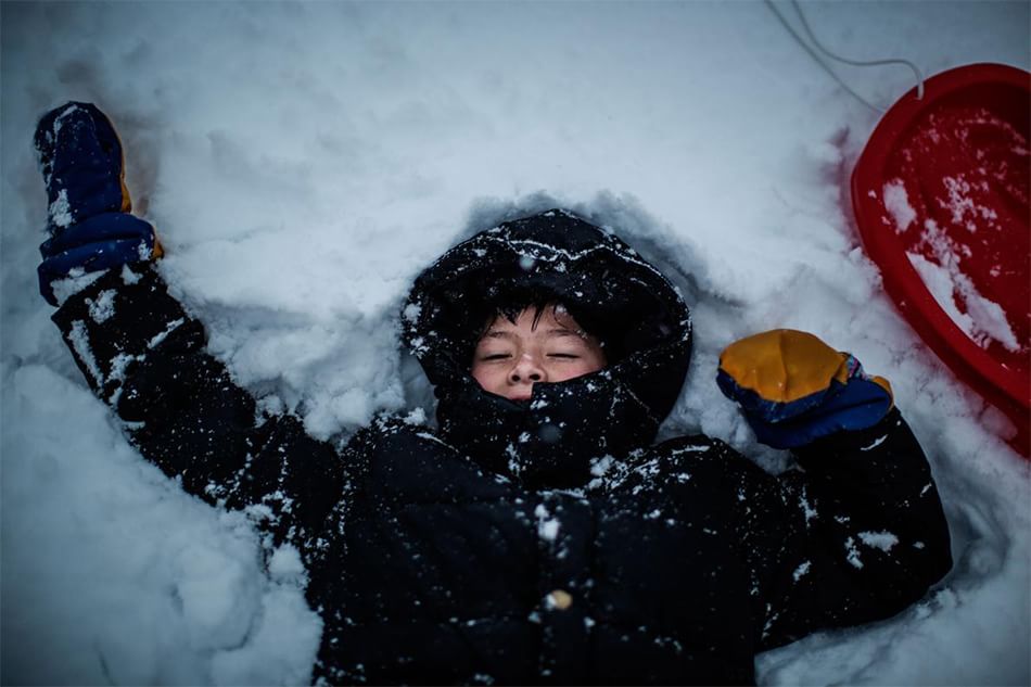 Foto e vita di seicento rifugiati accolti sopra il Circolo Polare Artico