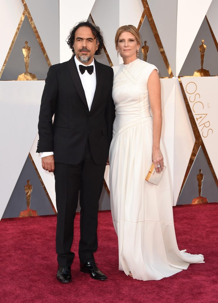 Alejandro Gonzalez Inarritu e la moglie Maria Eladia Hagerman in Prada