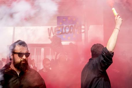 Activist attend a rally against border control between Austria and Italy