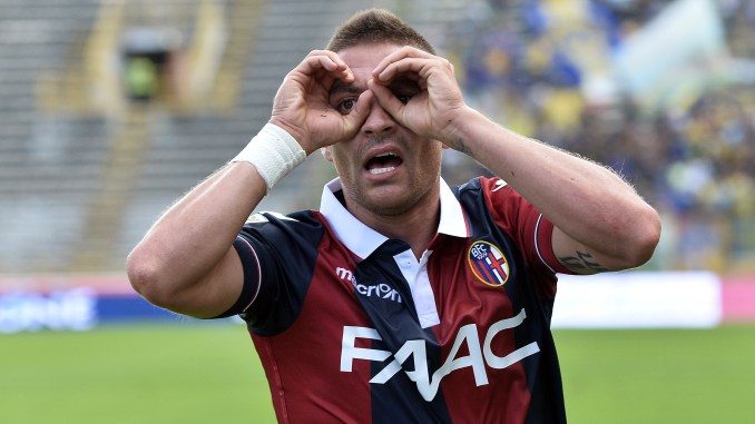 BOLOGNA, ITALY - SEPTEMBER 20: Anthony Mounier # 26 of Bologna FC celebrates after scoring the opening goal during the Serie A match between Bologna FC and Frosinone Calcio at Stadio Renato Dall'Ara on September 20, 2015 in Bologna, Italy. (Photo by Mario Carlini / Iguana Press/Getty Images)