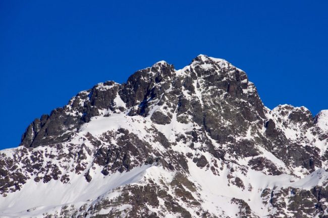 Escursionista sorpreso da neve e grandine sotto il Coca: soccorso a 2.600 metri