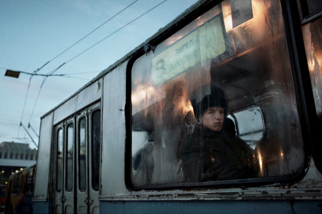 Christopher Anderson. A man on a bus. Russia, 1998