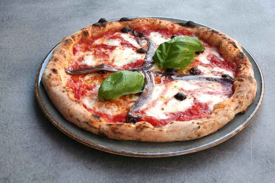 Ha aperto a Milano la pizzeria dove decidi tu quanto pagare