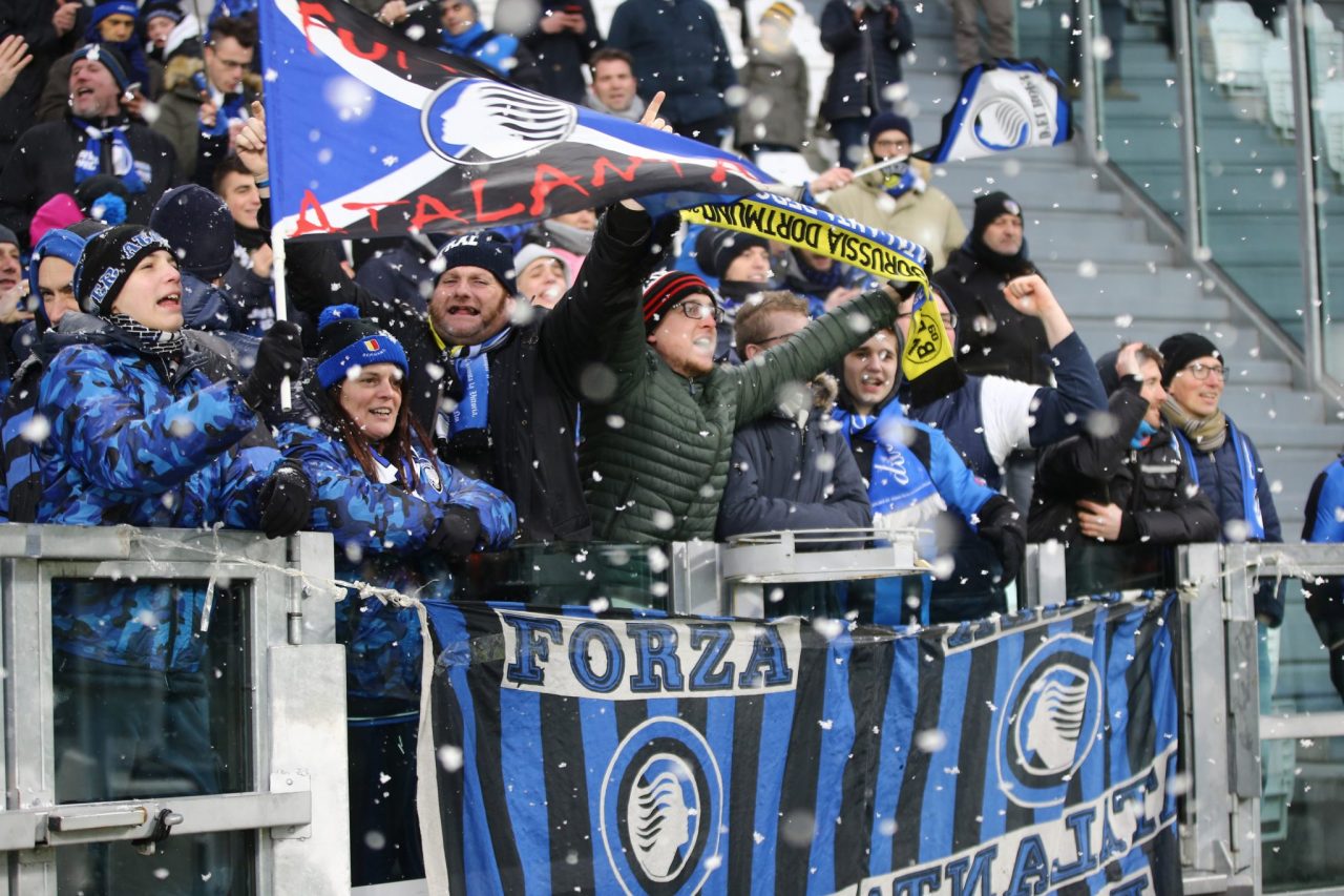 I sorrisi dei duecento nerazzurri nella neve dello Juventus Stadium