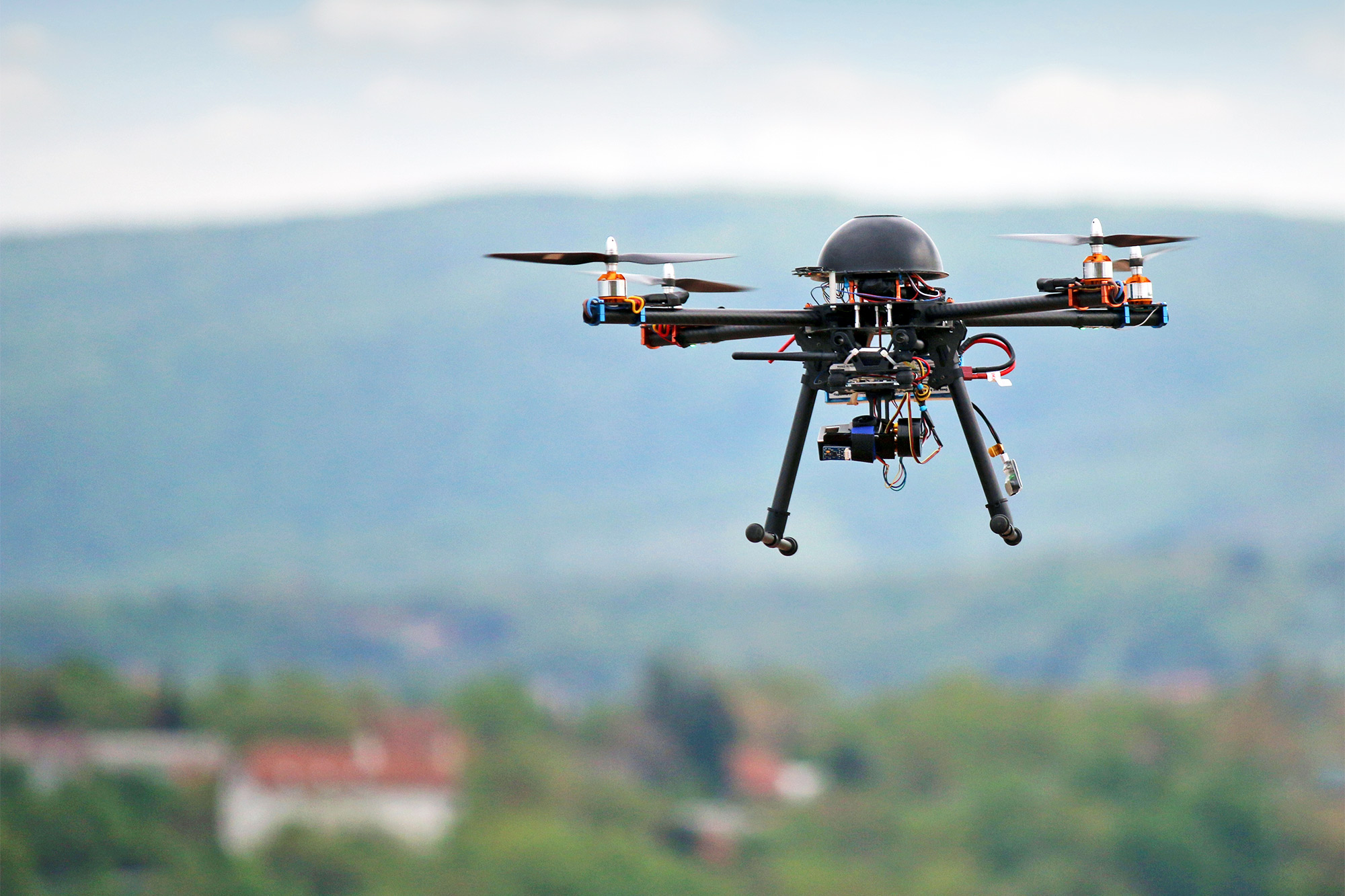 32249256_flying drone with camera on the sky