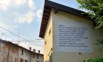 Sul muro di un edificio di Paladina è comparsa la poesia "Bambino" di Alda Merini