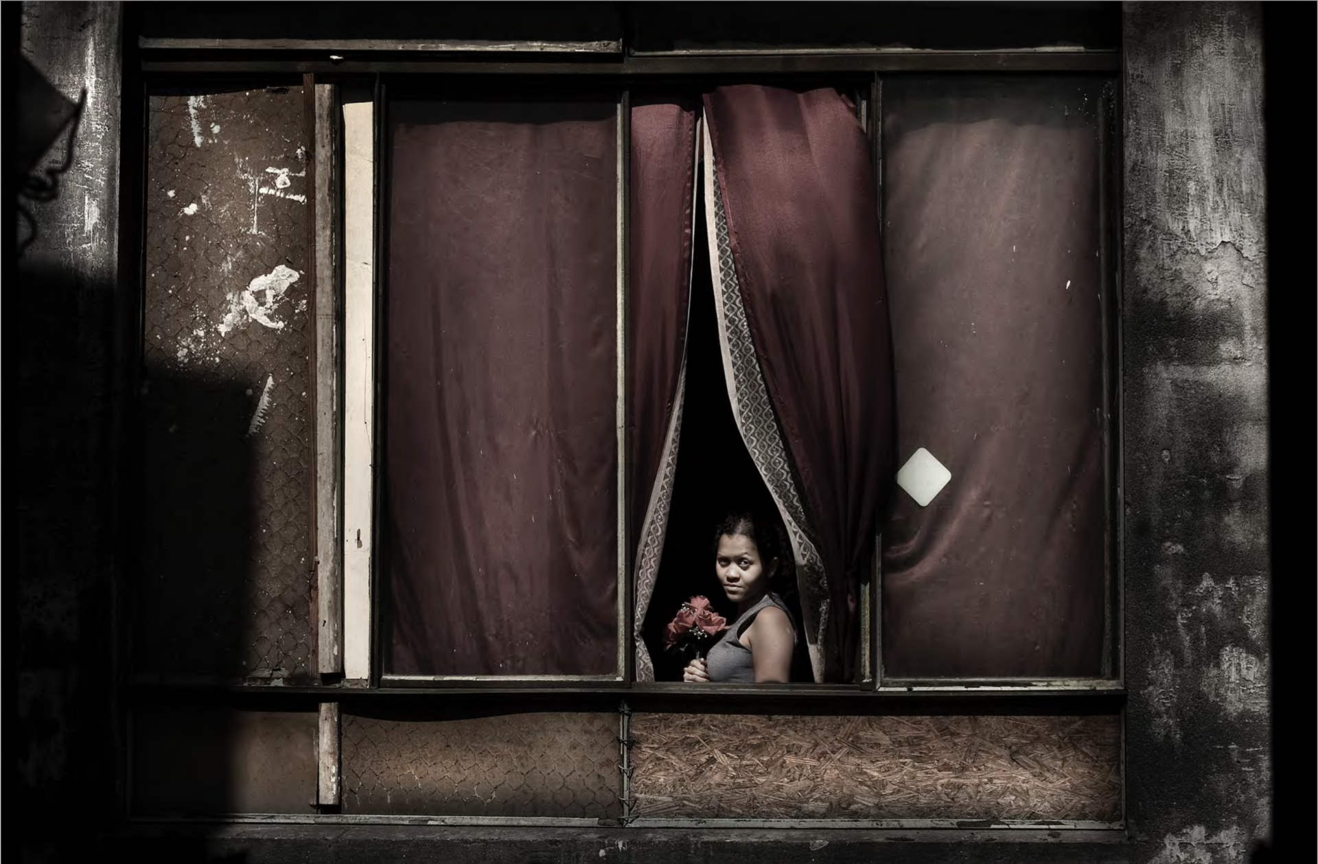 © Julio Bittencourt In a window of Prestes Maia 911 building São Paulo, Brazil 2