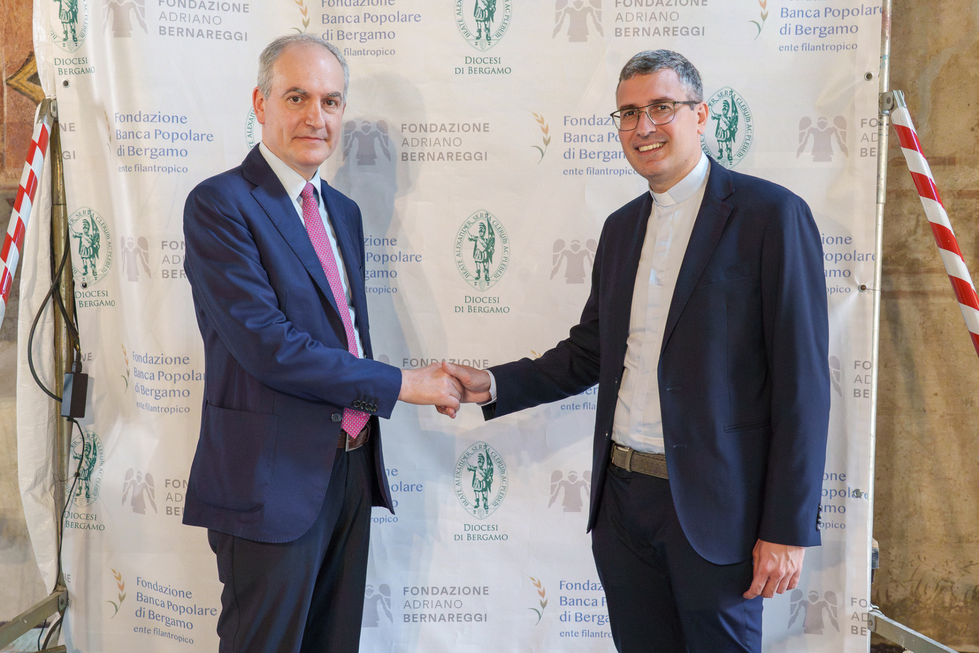 Da sx Santus e don Rota Conti